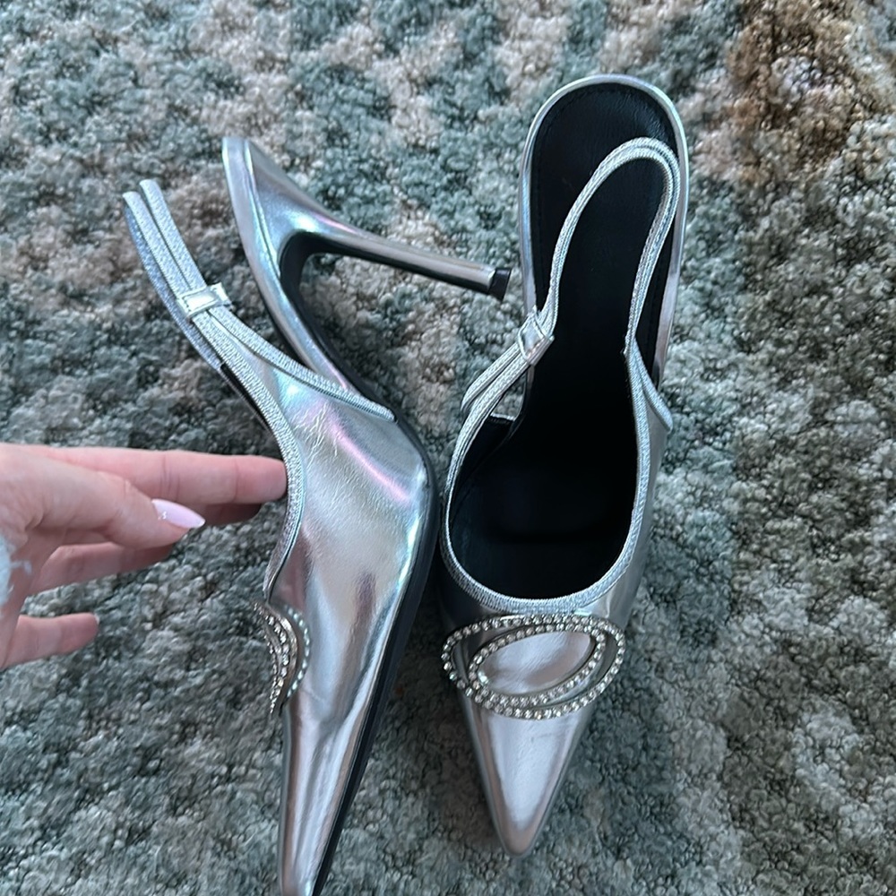 Brand new, metallic silver slingbacks